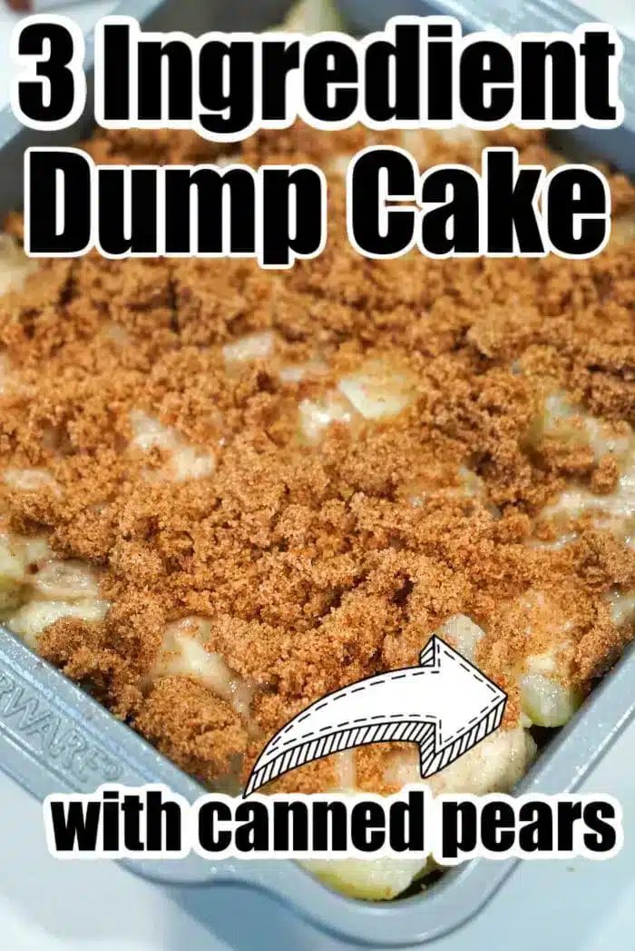 A close-up of a baking dish filled with dump cake, topped with a crumbly layer.
