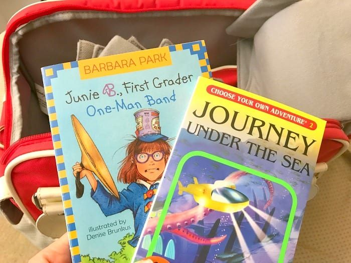Two children's books are displayed: Junie B. First Grader and Journey Under the Sea, both identifiable by their accelerated reader levels by color, making it easy for young readers to find a solid match for their reading journey.