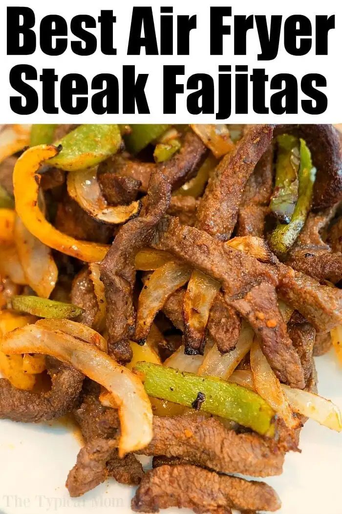 Close-up of cooked steak fajitas with green and yellow bell peppers and onions. The text above reads, "Best Air Fryer Steak Fajitas. Discover more good air fryer beef recipes today!