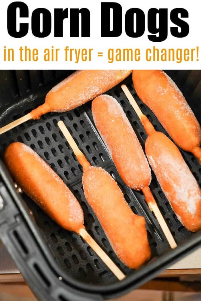 Frozen air fryer corn dogs arranged in a basket, ready to be cooked to crispy perfection.