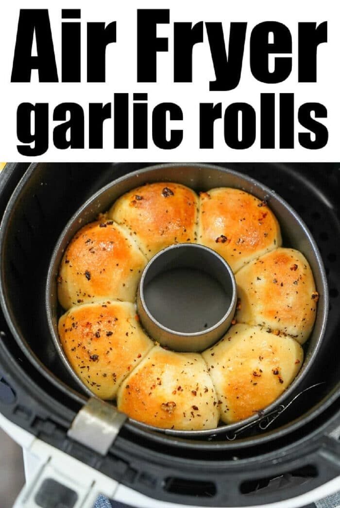 Golden garlic rolls arranged in a ring, baking in an air fryer basket—solid for making Frozen Rolls in Air Fryer with ease. Text reads: Air Fryer garlic rolls.