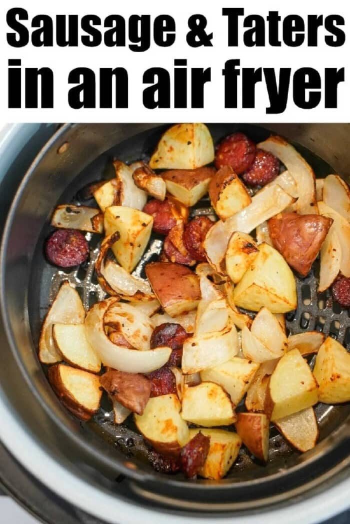 Air fryer sausage, potatoes, and onions are chopped and cooked to perfection in an air fryer basket for a quick and good meal.