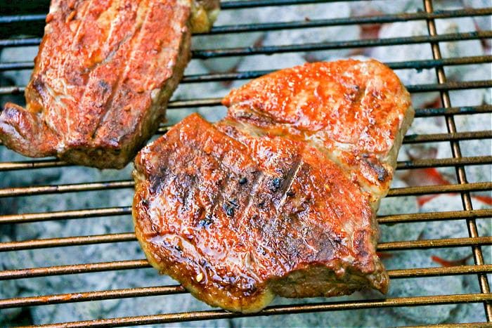 grilled steak with charcoal