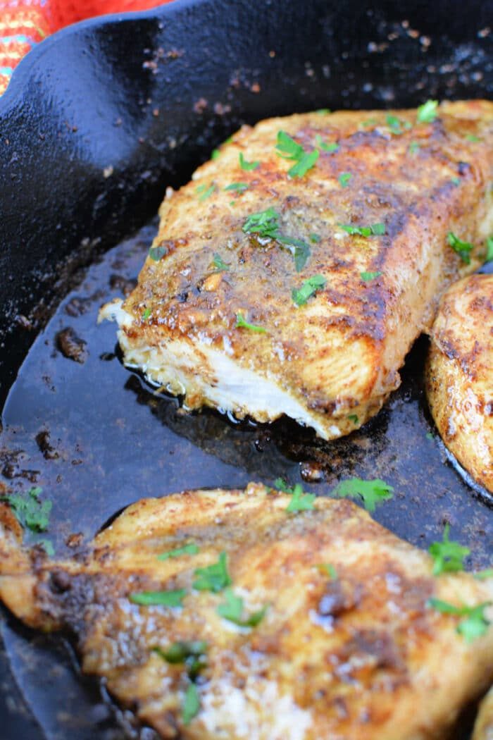 Chicken Pieces in Cast Iron Skillet