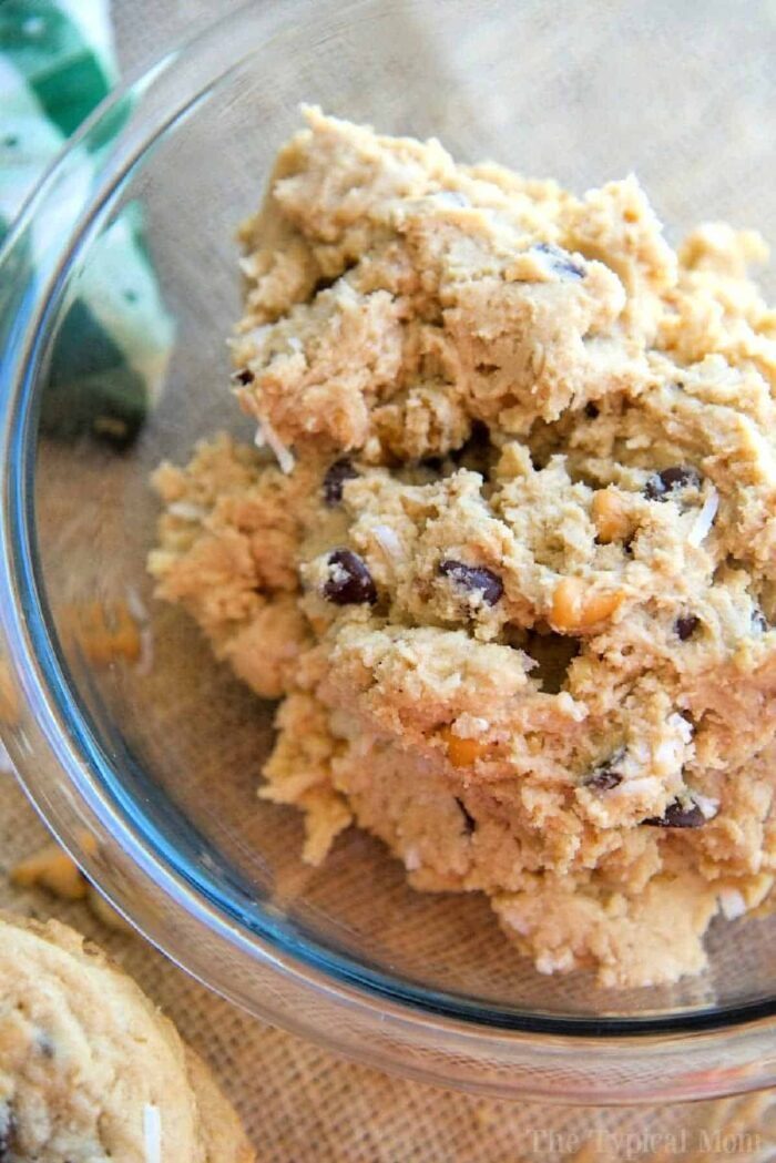 Totally loaded cowboy cookies with chunks of chocolate, nuts, and oats, looking deliciously crunchy.