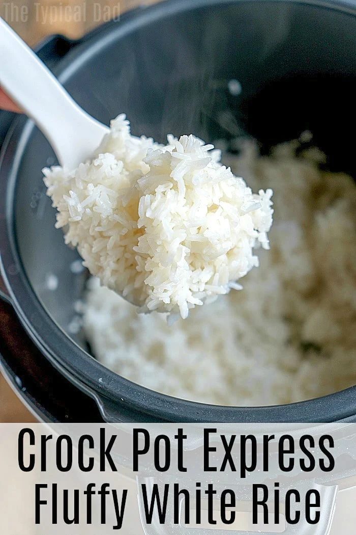 A spoon lifts a portion of fluffy white rice above a cooker, showcasing the perfection achieved with the Crockpot Express. The text at the bottom proudly declares, Crock Pot Express Fluffy White Rice.