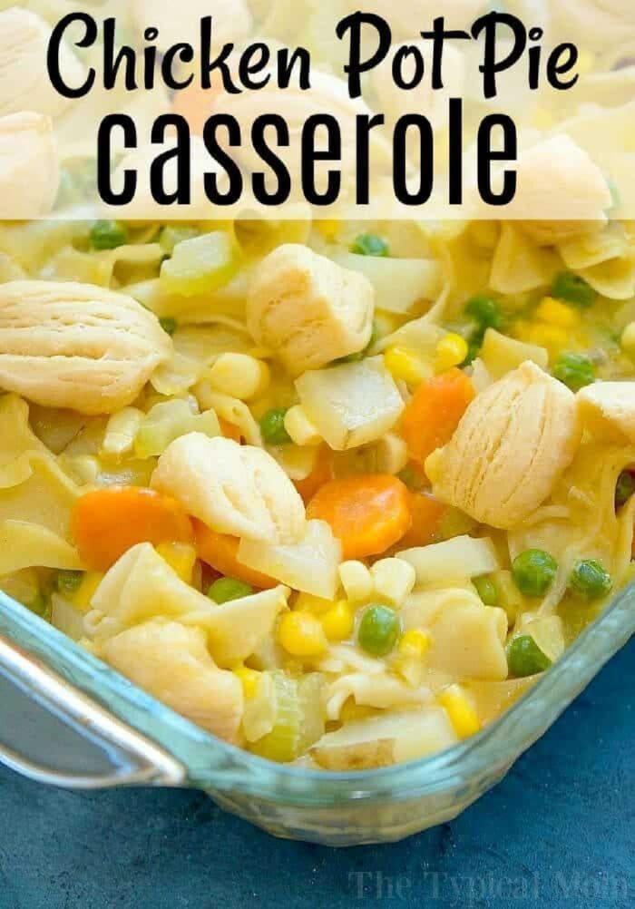 Easy chicken pot pie casserole with vegetables, noodles, and biscuit pieces baked together in a glass dish.