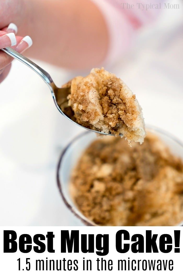 A spoonful of crumbly mug cake above a bowl with text: Best Easy Mug Cake Recipe! 1.5 minutes in the microwave.
