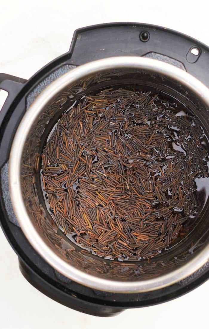 Cooking black rice in an instant pot without sticking involves filling the pot with water and adjusting the settings for solid results.