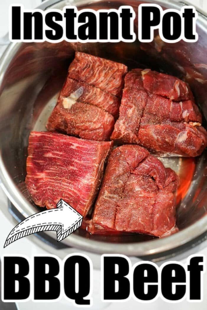 Chunks of raw beef in an Instant Pot, ready to be transformed into tender instant pot BBQ beef.