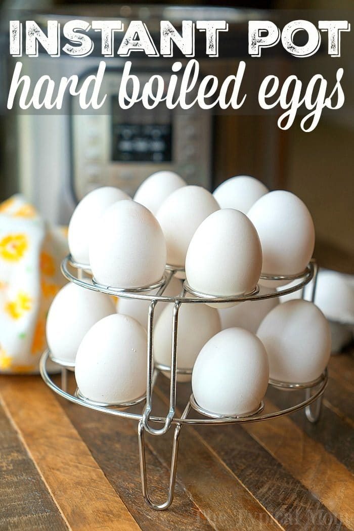 Eggs rest on a metal rack, ready to become instant pot hard boiled eggs in no time.