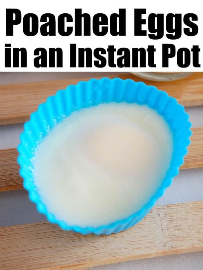 Poached egg in a blue silicone cup sits on a wooden surface, with text above sharing tips for solid Instant Pot poached eggs.