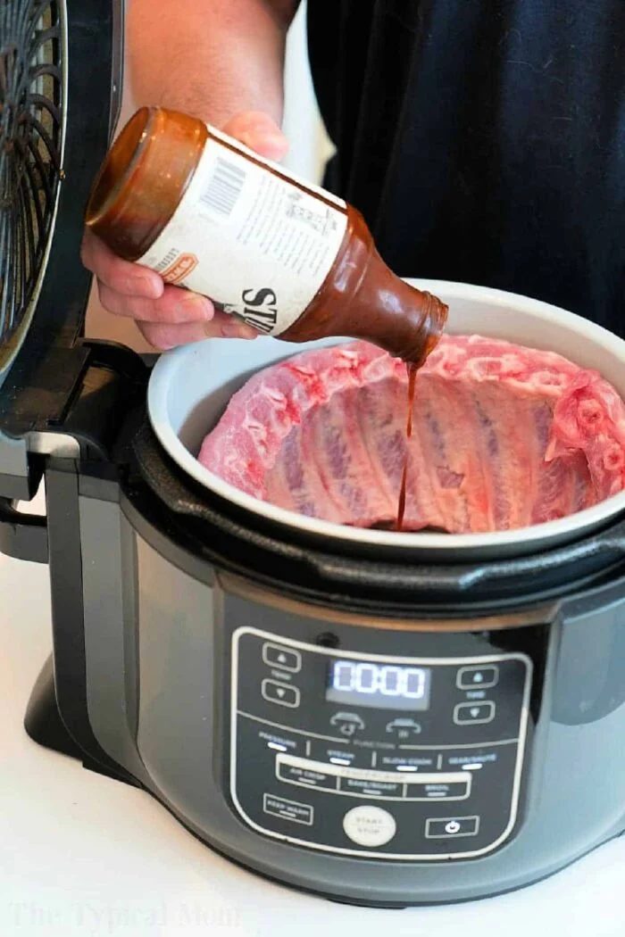 Tender, flavorful pork ribs cooked in a Ninja Foodi, coated in a savory barbecue glaze