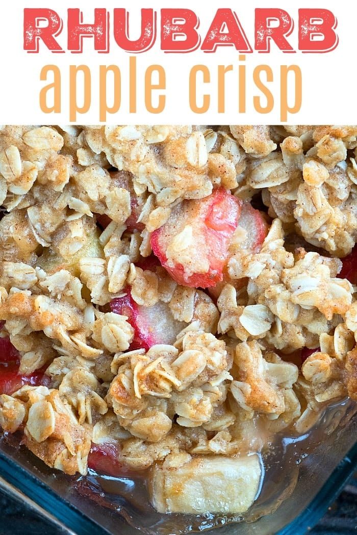 A close-up of rhubarb apple crisp with oat topping, showcasing pieces of rhubarb and apple underneath—this good dessert is reminiscent of a classic rhubarb crunch.