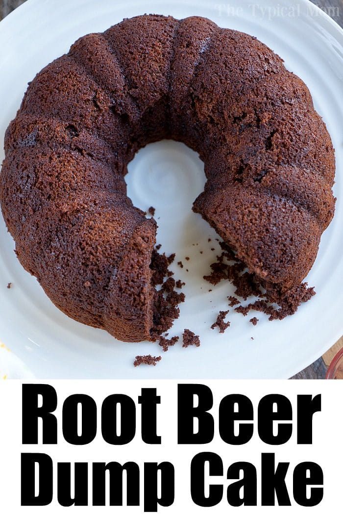 A chocolate bundt cake with a missing slice on a white plate, labeled Root Beer Dump Cake, showcasing the rich, moist texture of this classic root beer cake.