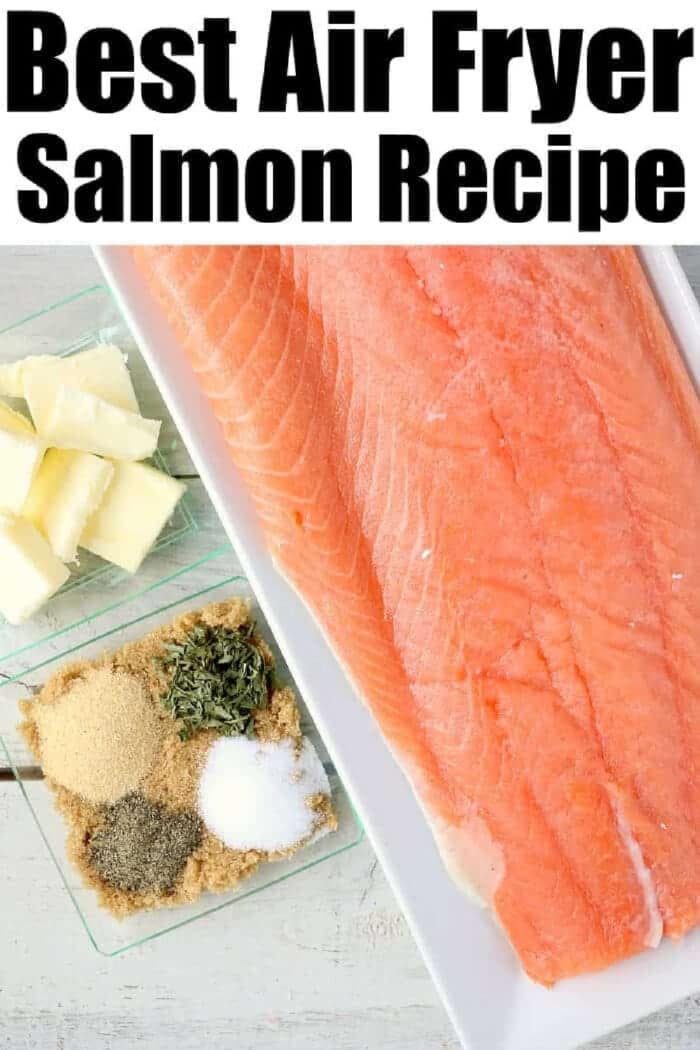 Raw salmon fillet with small dishes of butter and various seasonings on a light surface, solid for preparing salmon in the air fryer.