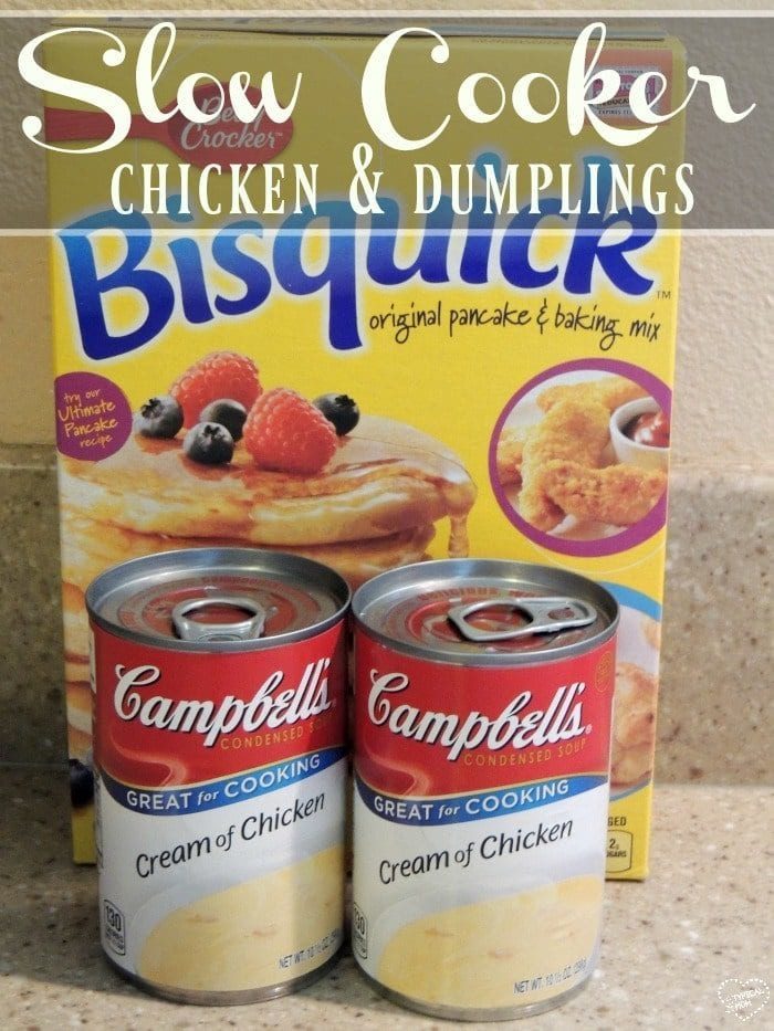 Bisquick box and two cans of Campbell's Cream of Chicken soup on a kitchen counter—solid ingredients for making classic slow cooker chicken and dumplings.