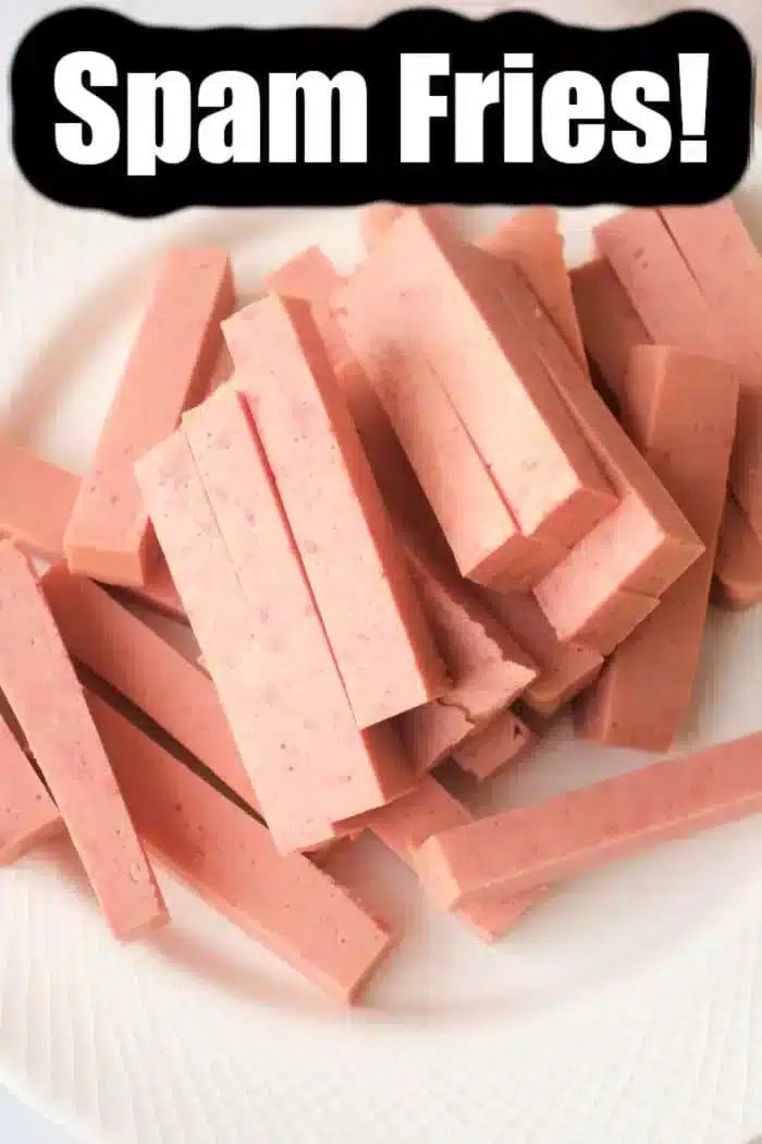 A white plate showcases pinkish rectangular strips resembling fries, made from spam. A bold black and white label confidently announces "good Spam Fries!