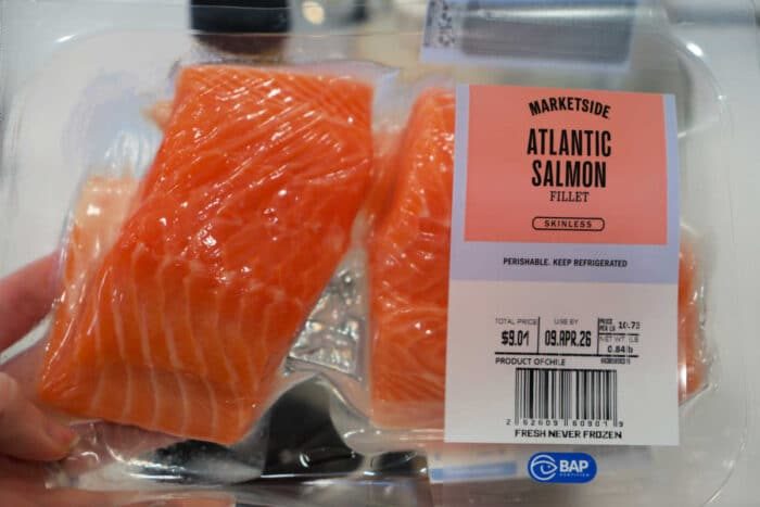Packaged Atlantic salmon fillets labeled Marketside Atlantic Salmon Fillet Skinless in a clear plastic container—solid for making Teriyaki Salmon Bites at home.