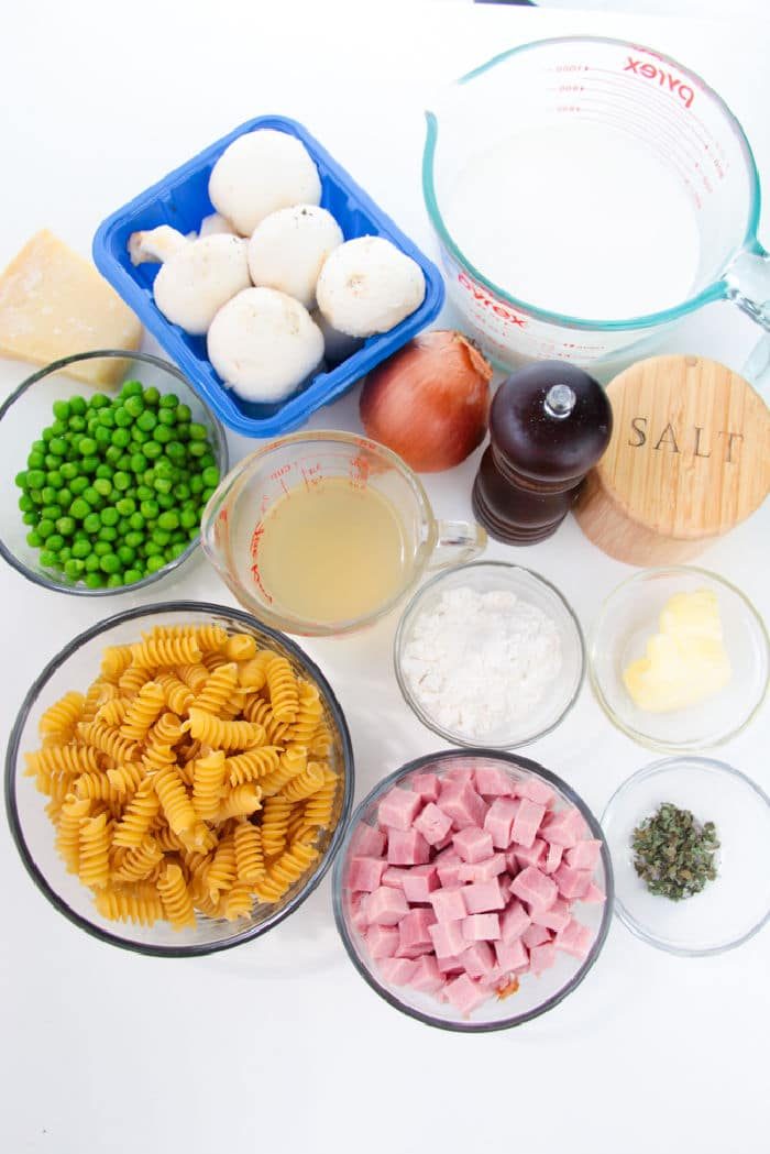 Ingredients for a delightful pasta dish include rotini, peas, turkey, and mushrooms combined with onion and cheese. A luscious mixture of cream, broth, flour, and butter brings it together. This twist on a classic tetrazzini recipe is perfectly seasoned for a comforting dinner treat.