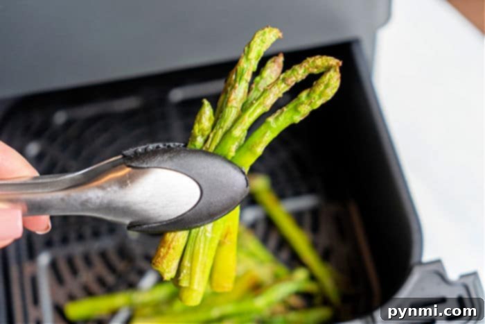 Unlock the Flavor of Frozen Asparagus 5 Cooked frozen asparagus served on a plate