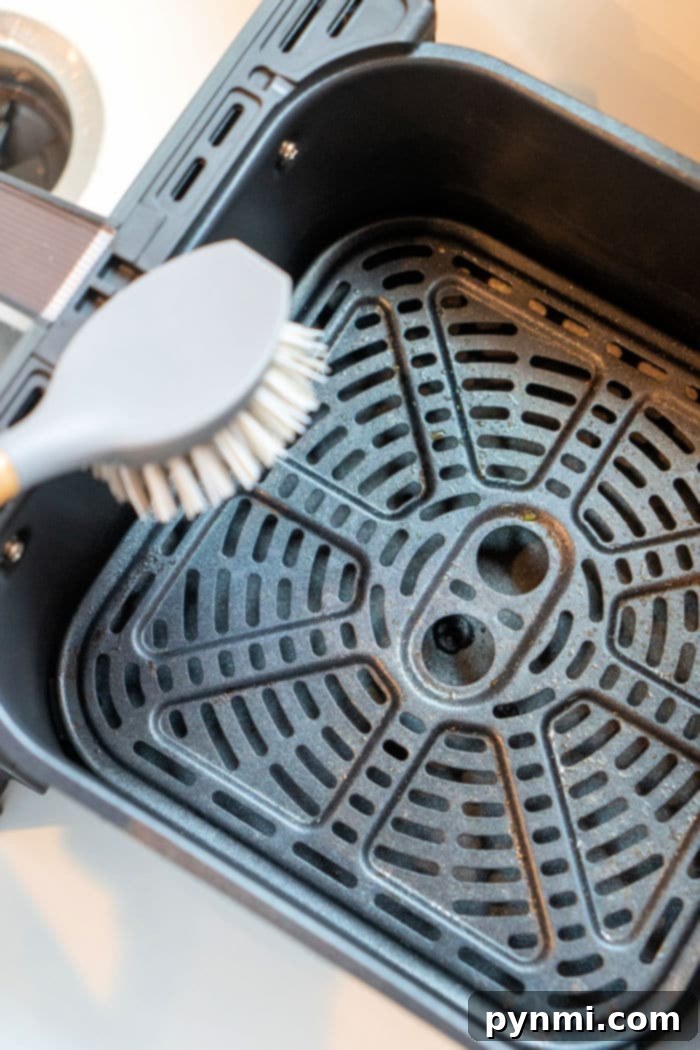Detailed view of how to clean an air fryer basket
