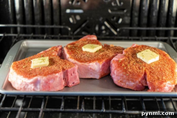 Deliciously baked pork chops with a golden-brown crust and clear juices