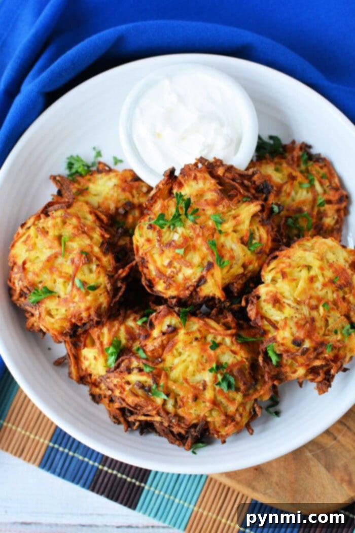 Crispy Air Fryer Latkes served with sour cream and chives
