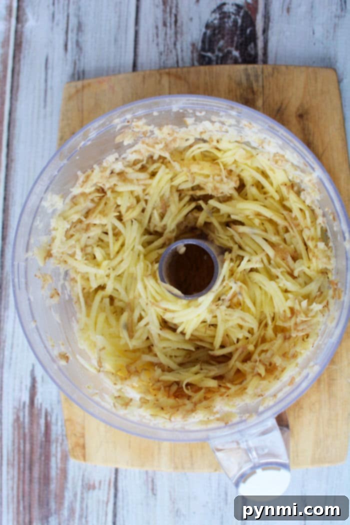 Close-up of freshly shredded potatoes, the key ingredient for delicious latkes