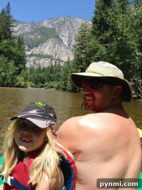 Family enjoying river rafting on the Merced River, a top activity for things to do in Yosemite with kids.