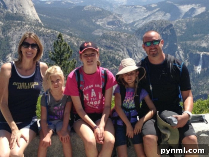 Yosemite Valley view with a family silhouette, emphasizing why Yosemite is great for families.