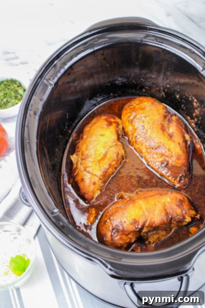 From Freezer to Feast: Slow Cooker Chicken Breasts 8 Slow Cooker Chicken Caprese, a delicious and tender dish, presented ready to eat.