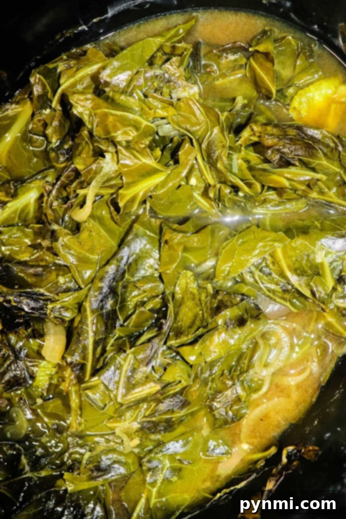 Soulful Slow Cooker Collard Greens 2 Delicious Slow Cooker Collard Greens simmering in a crockpot