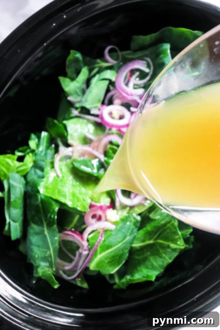 Soulful Slow Cooker Collard Greens 6 Prepared collard greens in a slow cooker, ready for cooking