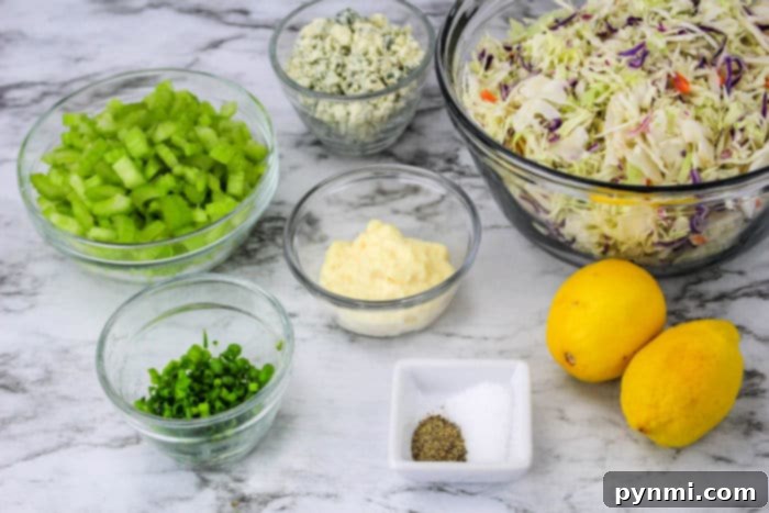 Bold Blue Coleslaw 3 Homemade coleslaw with crumbled blue cheese, showcasing a rich and creamy texture