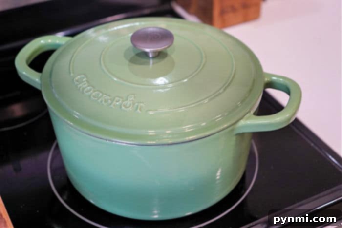 Tender Oven-Braised Oxtails 3 dutch oven on a kitchen counter