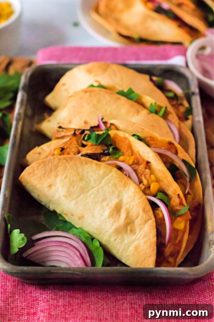 Perfectly crispy Air Fryer Tacos ready to be filled with your favorite ingredients.