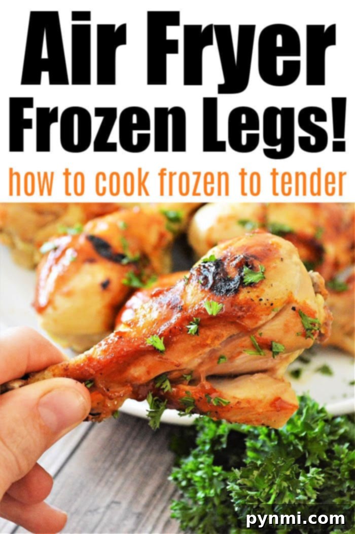 Crispy and juicy air fryer frozen chicken legs, perfectly cooked with golden-brown skin, ready to be served for a quick and easy dinner.