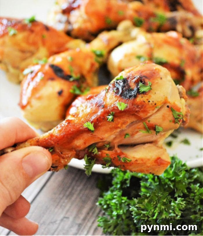 A close-up of crispy and perfectly cooked Air Fryer Frozen Chicken Legs, demonstrating their golden texture and enticing appeal.