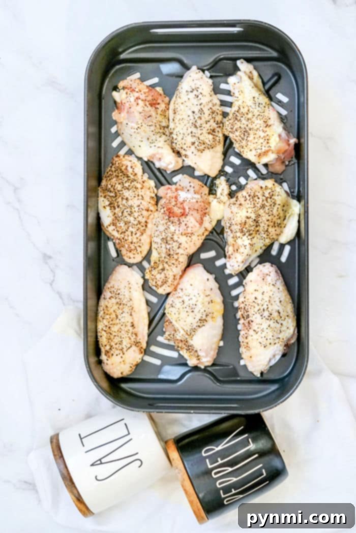 Salt and Pepper Chicken Wings: A Crispy Delight 4 Salt and Pepper Wings Air Fryer, perfectly spaced for maximum crispiness