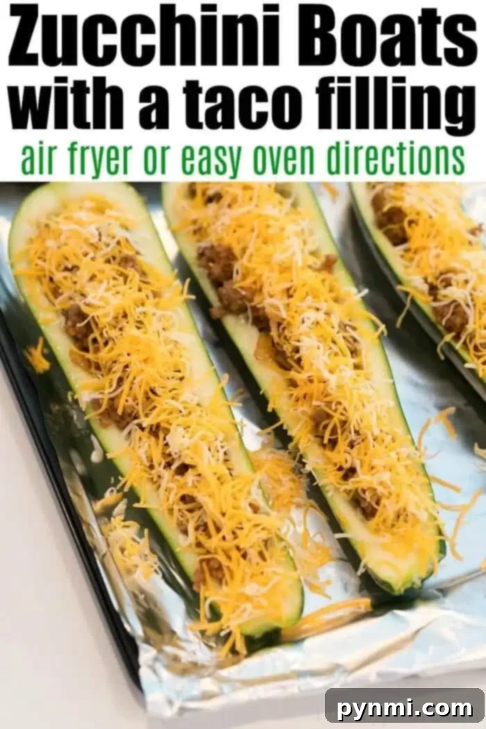 Creative Leftover Taco Meat Meals 3 Close-up of zucchini boats filled with leftover taco meat and topped with shredded cheese on a foil-lined baking sheet. The text reads: Zucchini Boats with a taco filling - air fryer or easy oven directions.