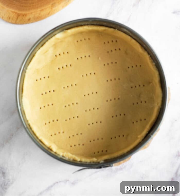 3 ingredient pie crust without food processor - golden and ready for filling