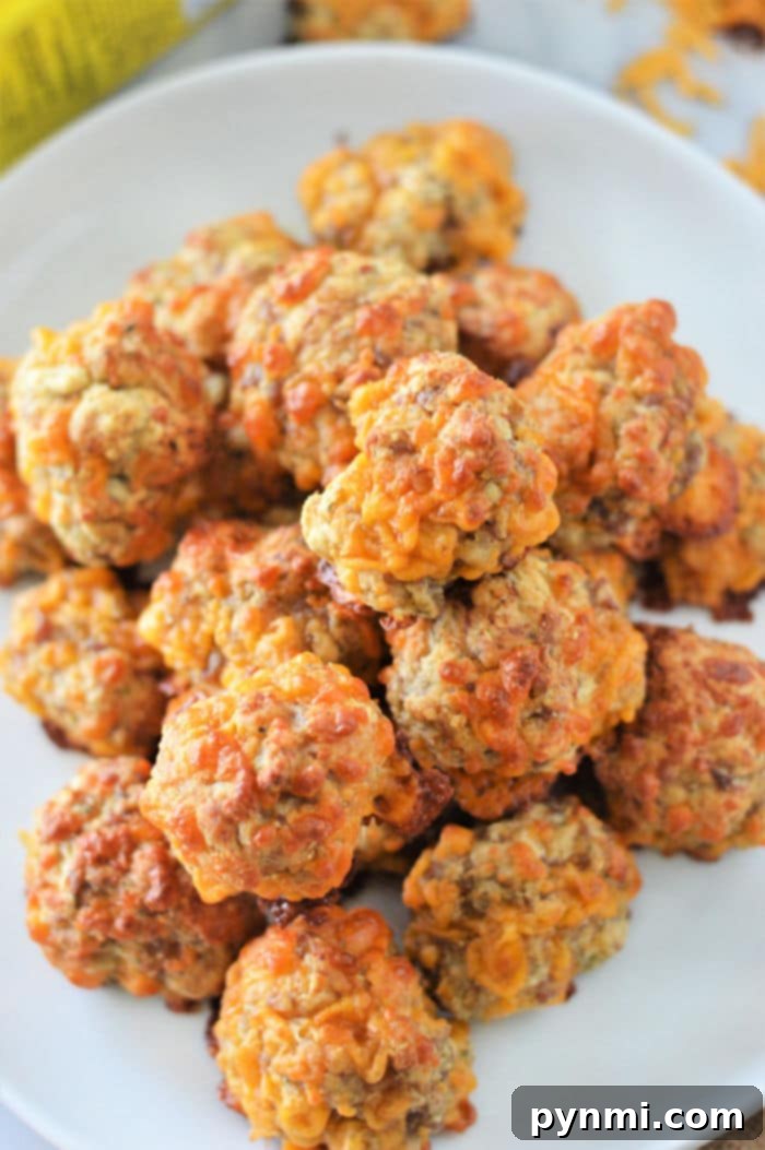 Effortless Bisquick Creations 5 Delicious 3-ingredient Bisquick Sausage Balls, perfect for a quick snack or appetizer.