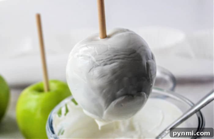 Ghostly White Chocolate Candy Apples 4 Festive gluten-free Halloween treats, chocolate covered apples adorned with edible eyes.
