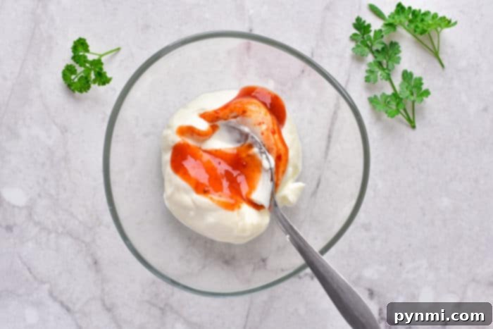 How to Make Shrimp Taco Sauce - A bowl of creamy, tangy sauce perfect for drizzling over shrimp tacos.