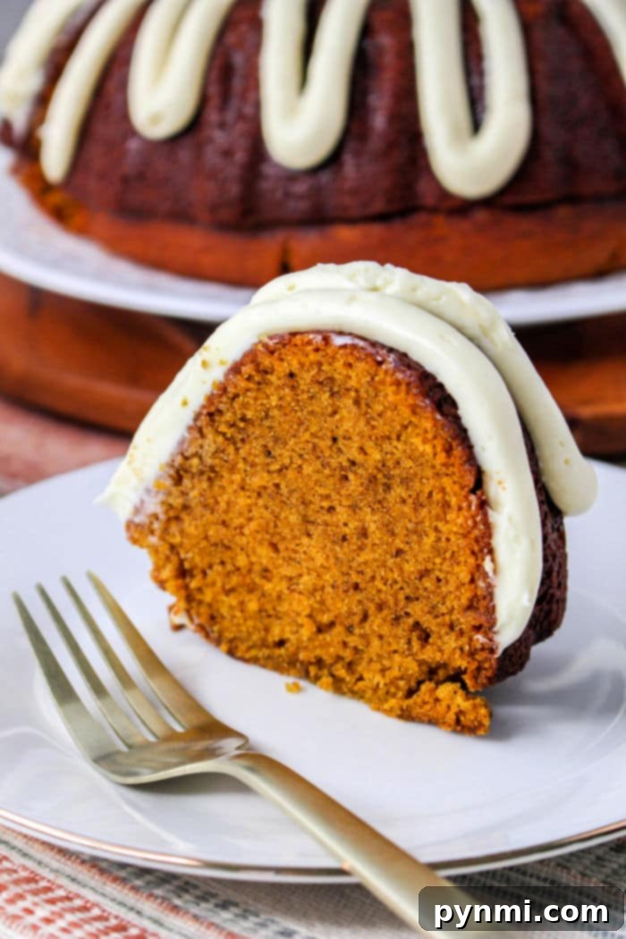 Mastering Bundt Cake Baking Times 7 Pumpkin Bundt cake with cream cheese frosting drizzled on top
