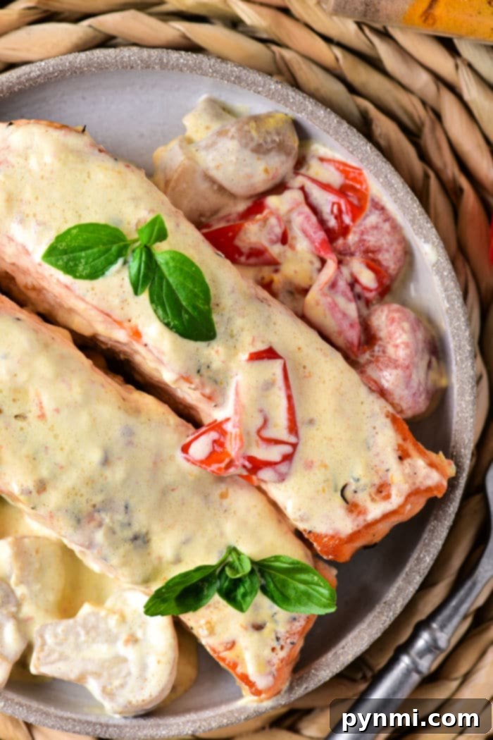 Mastering Sockeye A Guide to Delicious Salmon 2 Perfectly cooked sockeye salmon fillet in a creamy sauce, ready to be served.