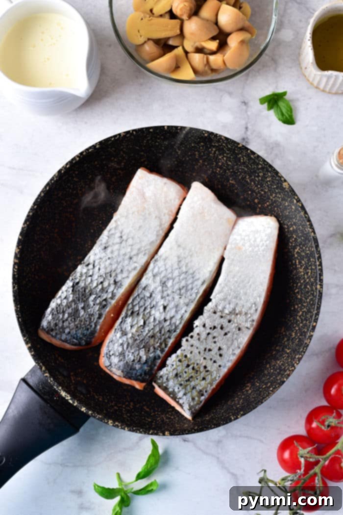 Mastering Sockeye A Guide to Delicious Salmon 7 Beautifully pan-seared sockeye salmon fillets, garnished with fresh herbs, in a rustic setting.