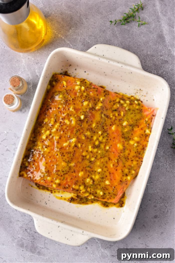 Sweet and Tangy Honey Mustard Salmon 4 Salmon with Mustard Sauce, garnished with fresh herbs
