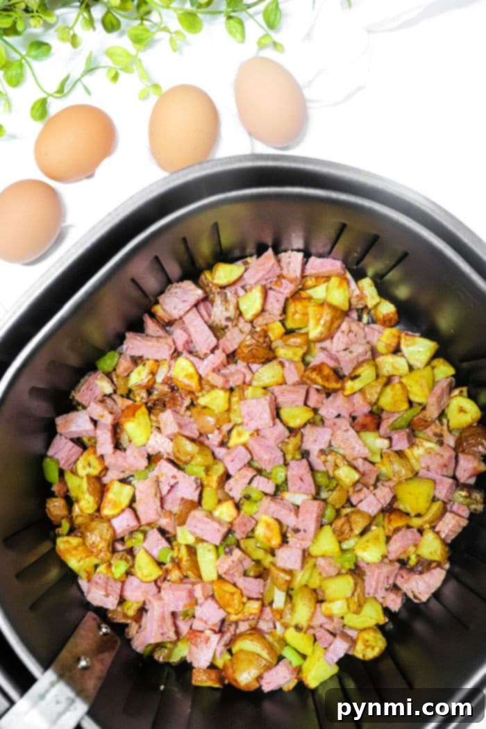 Crispy Air Fryer Corned Beef Hash 5 Crispy Corned Beef and Hash Recipe in an air fryer basket